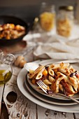 Penne with chicken, Kalamata olives, tomatoes and pine nuts