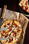 Pizza with artichokes, halloumi and pastirma (air-dried cured beef, Turkey)