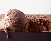 Nut ice cream in an ice cream tub
