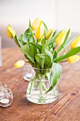 Yellow tulips on table for mother's day brunch