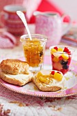 Scones with citron marmalade and fruit salad, for tea