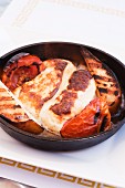 Flamed Halloumi Cheese with Pears and Tomatoes