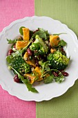 Broccoli salad with pumpkin, kidney beans and rocket