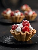 Raspberry tartlets with lentil mousse and mini marshmallows
