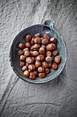 Lots of hazelnuts in a bowl