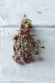 Dried wild thyme on a linen cloth