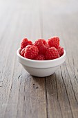 Raspberries in a small bowl