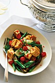 Fried tofu with green beans and cherry tomatoes