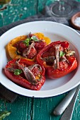 Stuffed roasted peppers with anchovies and basil