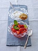 Fresh strawberries with limes, cream and an almond biscuit