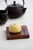 Wagashi yuzu (Japanese citrus fruit) with a teapot (Japan)