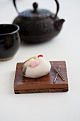 Wagashi crane (for New Year) with a teapot (Japan)