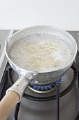 Soba noodles in boiling water (Japan)