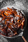 Tarte tatin dusted with icing sugar