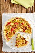 Quiche with ham, leek and peppers