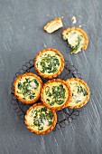 Several spinach tartlets (view from above)