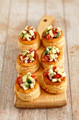 Vol au vents with avocado and tomato salad