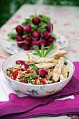 Quinoa salad with radishes and chicken breast