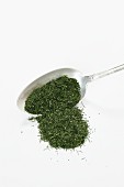 Dried dill on a spoon