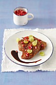 Veal with grapes and pomegranate seeds