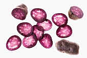 Purple potatoes (whole, cut in half, and slices)