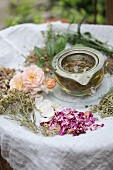 Aromatised women's tea in a tea strainer
