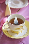 A Cup of Tea Steeping with a Triangular Tea Bag