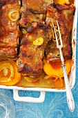 Pork ribs with onions and peaches