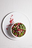 Pomegranate salad with herbs and hazelnuts