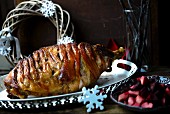 Baked ham glazed with cider for the Christmas celebration