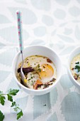 Baked egg with chanterelles and goat cheese