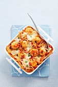 Spaghetti bake with chicken dumplings and tomato sauce