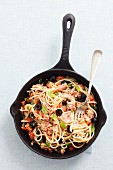 Spaghetti with tuna, tomatoes and black olives