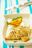Grilled halibut fillets with rosemary and lemon