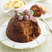 Christmas pudding with sugared grapes