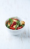 cherry tomatoes with arugula and roasted bread