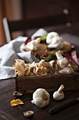 Mushrooms and Garlic in a Wooden Box