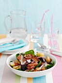 Spinach salad with potatoes and bacon