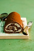 Chocolate sponge roll with fruit filling
