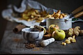 Chopped apples in a pan with spices and ginger