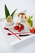 A dessert plate with strawberries, cr