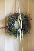 Wreath of pine branches, cones and sloes