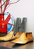 Vintage wooden shoe lasts and ornamental letter