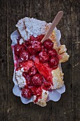 Kaiserschmarren (shredded sugared pancake from Austria) with warm cherries