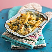 Pasta bake made with penne, haddock and spinach