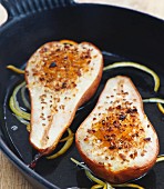 Pears with apricot confit, sesame seeds and lemon, cooked in the oven