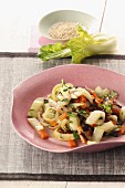 Stir-fried pak choi with carrots and sesame seeds