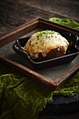 Truffle twice baked potato, cheese and chives