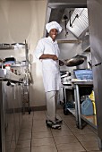 An African chef in a commercial kitchen