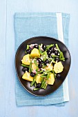 Potato salad with green beans, olives and vinaigrette